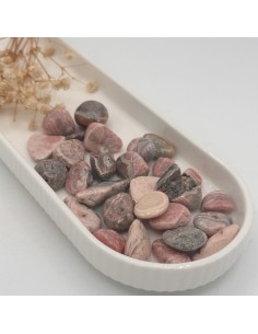 Rodocrosite rolada, cristal para cura do coração ferido, resgate da criança interior e libertação emocional suave.