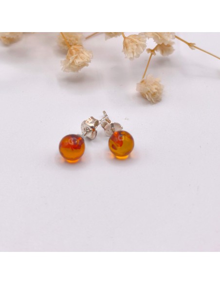 Pendientes de ámbar en plata que promueven equilibrio emocional, protección luminosa y vitalidad interior