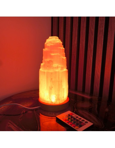 Candeeiro de selenite com base LED multicolor e comando para purificação energética e ajuste vibracional.