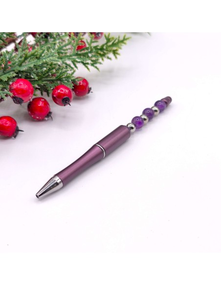 Bolígrafo espiritual con esferas de Amatista para escritura consciente.