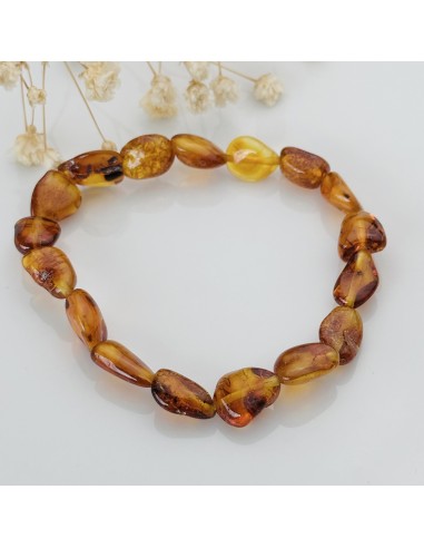 Pulseira de âmbar em formas naturais para vitalidade, proteção energética e equilíbrio emocional no dia a dia.