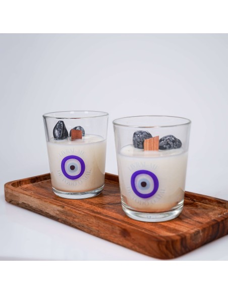 Vela de protección energética con ojo griego y obsidiana nevada para alejar envidia