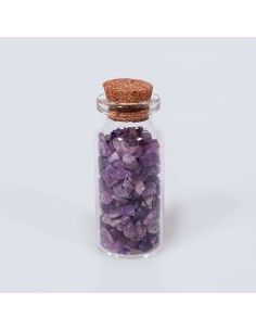 Frasco con cristales de lepidolita para calma mental, reducción de la ansiedad y equilibrio emocional.