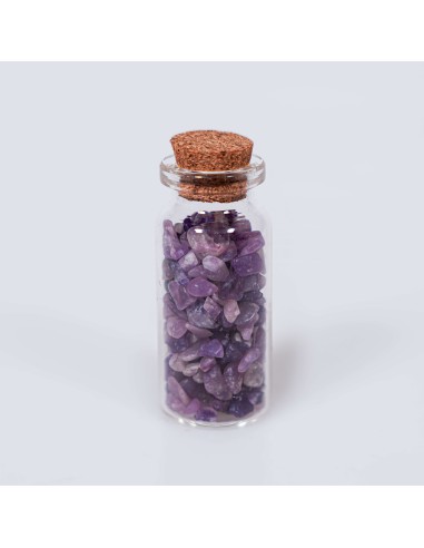Frasco con cristales de lepidolita para calma mental, reducción de la ansiedad y equilibrio emocional.