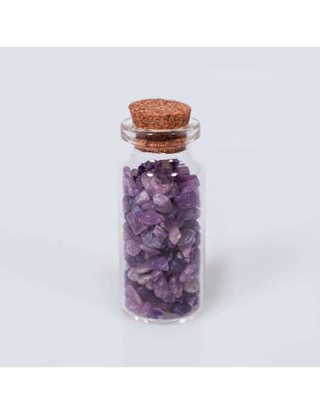 Frasco con cristales de lepidolita para calma mental, reducción de la ansiedad y equilibrio emocional.