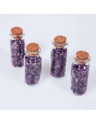 Frasco con cristales de lepidolita para calma mental, reducción de la ansiedad y equilibrio emocional.