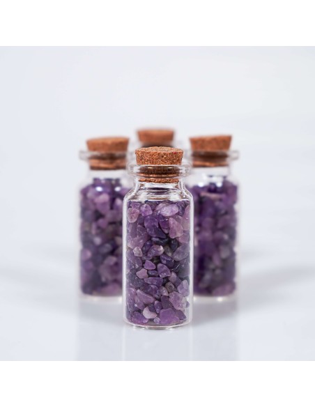 Frasco con cristales de lepidolita para calma mental, reducción de la ansiedad y equilibrio emocional.